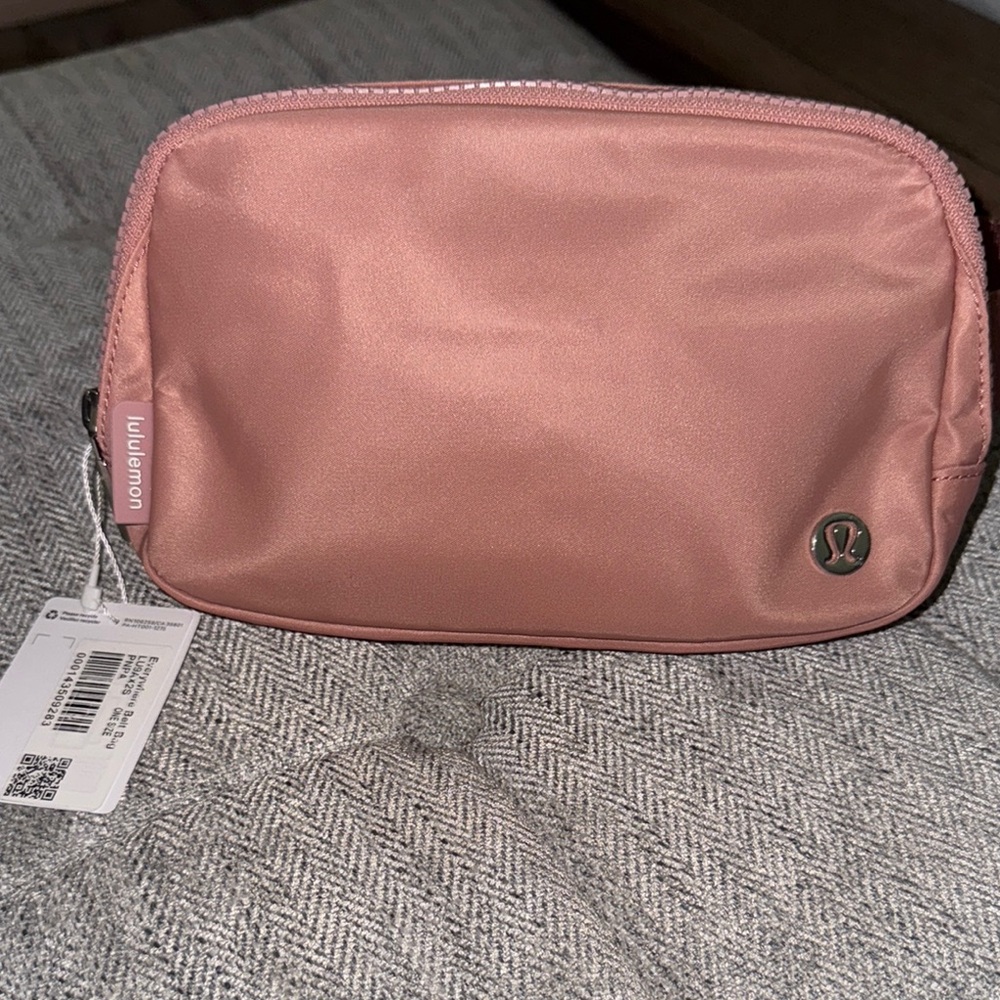 NWT, Lululemon everywhere belt bag in a soft pink